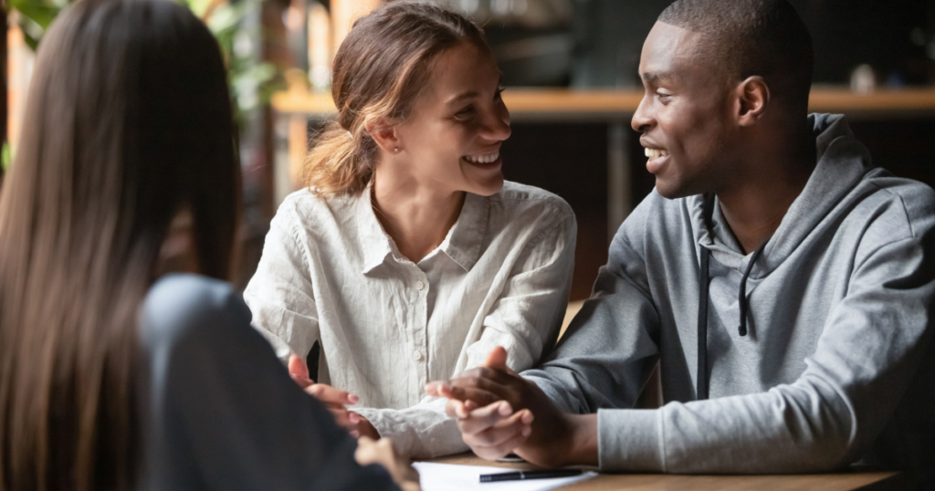 couple at a table looking at paperwork